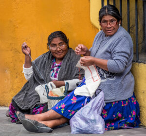 photo of two Sisters Crocheting by Kenny Gilbride, Photography